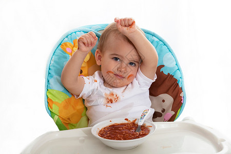 宝宝吃饭时一团糟高清图片
