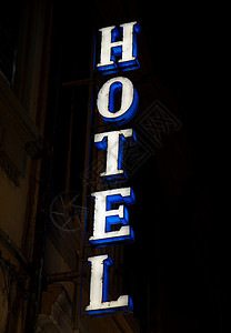 夜晚酒店标志背景图片