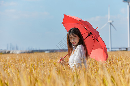 红雨伞文艺美女手撑红伞背景