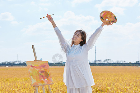 文艺清新美女户外油画写生图片