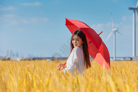 文艺美女手撑雨伞高清图片
