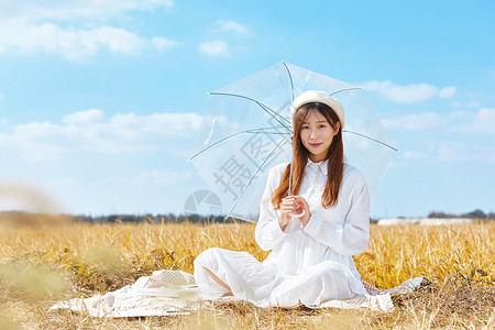 文艺美女手撑雨伞高清图片