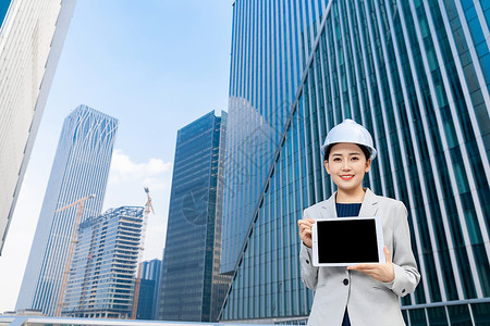 女性建筑工程师美女拿平板电脑高清图片