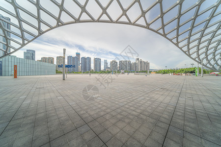 生活小区深圳湾体育馆地面汽车背景图背景