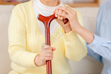 老人拄拐素材拄拐杖的老奶奶特写背景