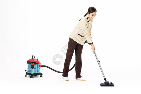 家政服务女性使用吸尘器背景图片