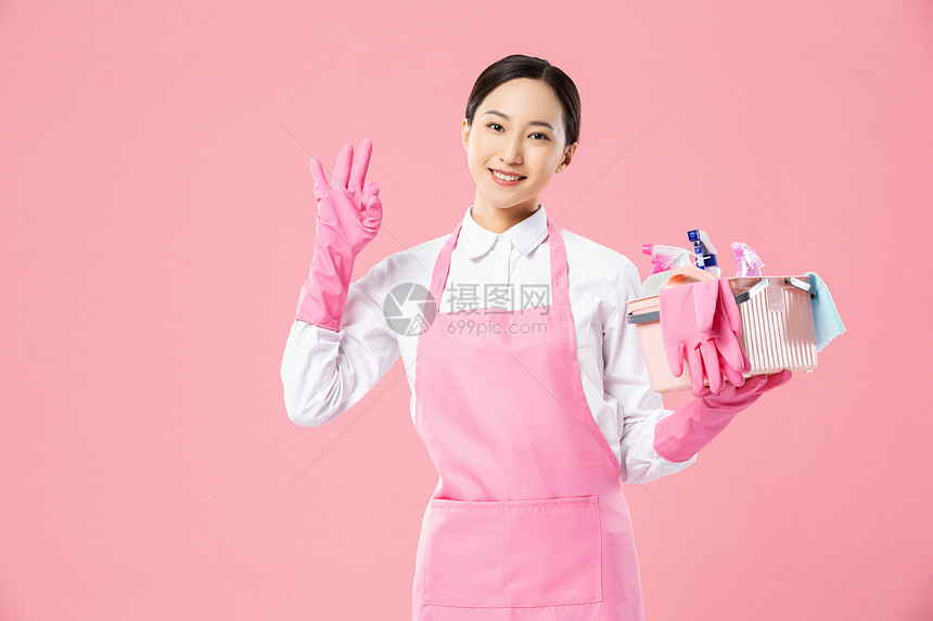 家政服务女性手提清洁工具图片