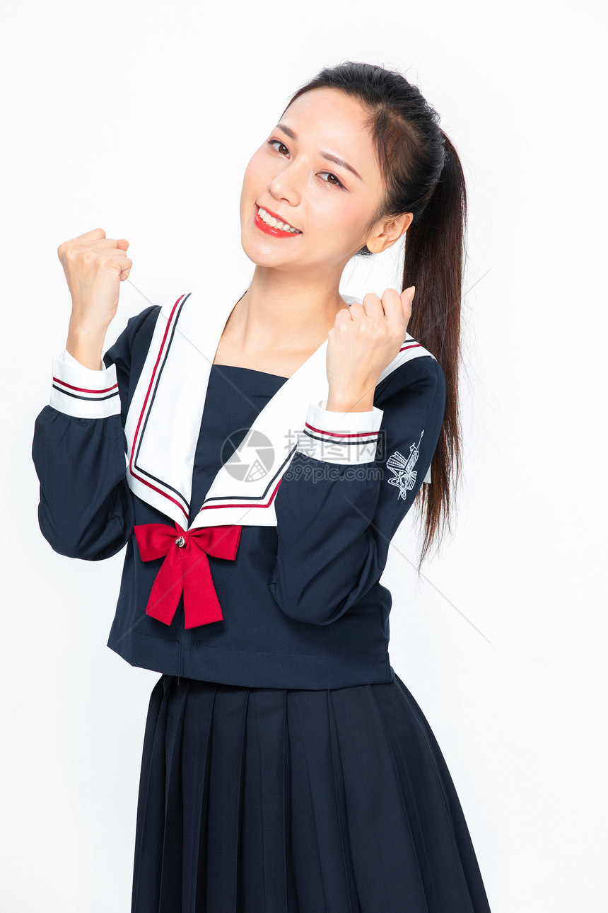 学院风大学生JK服美女握拳加油庆祝图片