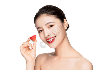 创意美妆美女吃草莓高清图片