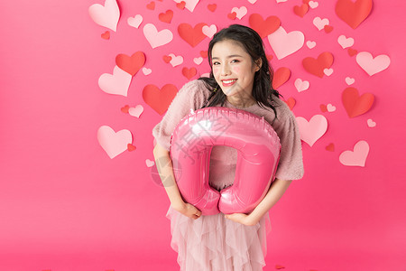 抱气球的情人节美女背景图片