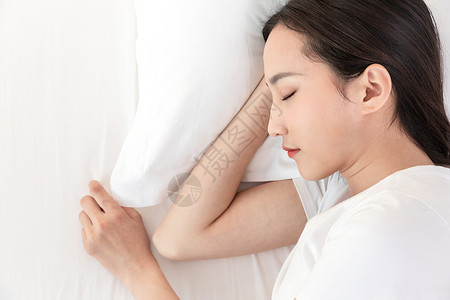 居家青年女性睡觉睡眠背景图片