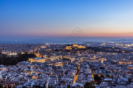 希腊首都雅典城市夜景天际线背景图片