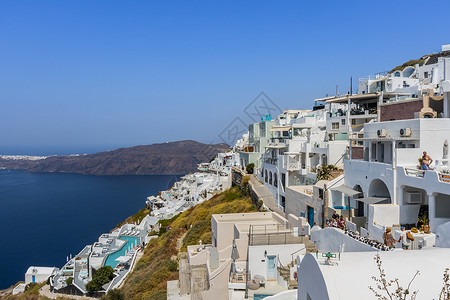 希腊海岛圣托里尼海岛上的度假酒店背景图片