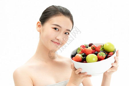 健康活力美妆少女与水果图片