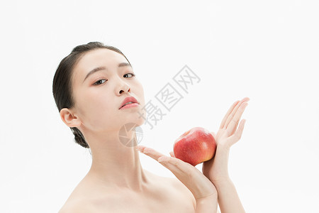 美妆少女与苹果背景