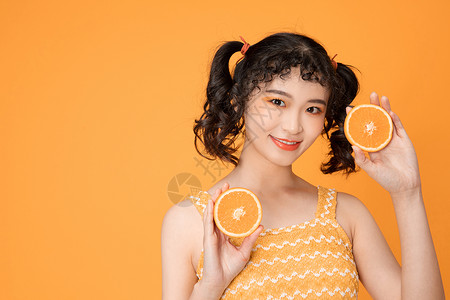 甜美少女与橙子背景图片