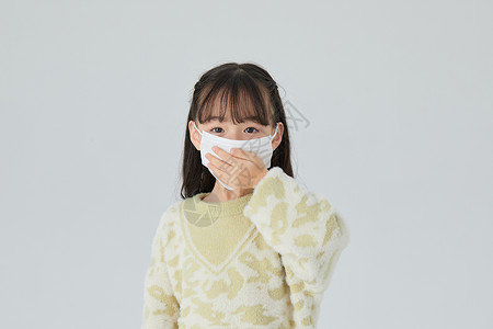 流感预防小女孩戴着口罩背景
