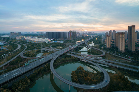 线立体花素材夕阳落日下武汉南三环线立交桥车流交通背景