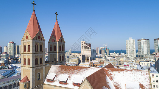 圣玛德琳教堂青岛天主教堂雪景背景