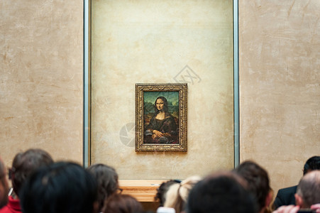 法国巴黎卢浮宫博物馆的油画《蒙娜丽莎》背景图片