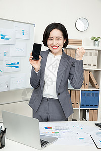商务女性手机办公图片