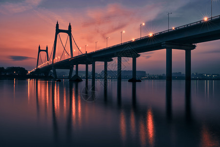 黄昏长沙三汊矶大桥剪影背景图片