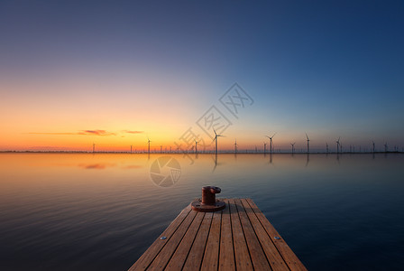 黄海风力发电日落风光背景图片