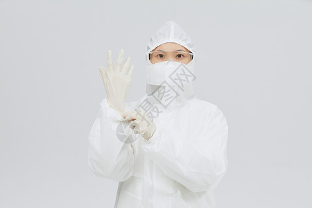 镜头视角穿防护服戴手套的医护人员背景
