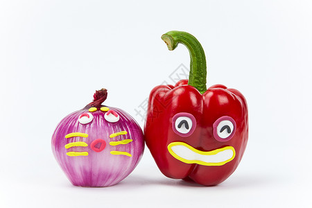 愚人节创意蔬菜辣椒和洋葱背景图片