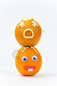 橙子表情水果愚人节创意水果组合背景