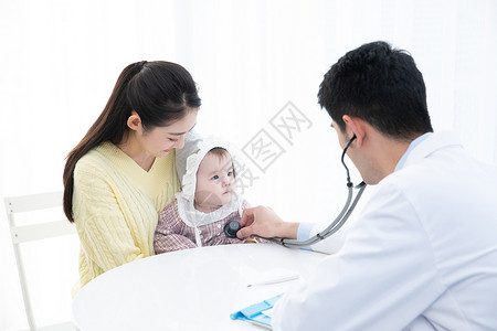 医生听婴儿心跳背景图片