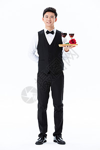 递送红酒和玫瑰花的服务员形象高清图片