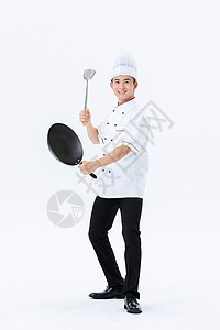 厨师手持锅铲形象高清图片