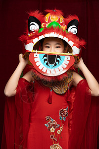 国潮儿童拿着舞狮背景图片