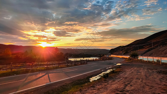 新疆伊犁特克斯县夕阳落日风景背景图片