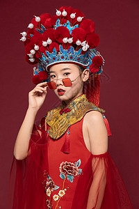 国风京剧中国风潮流儿童拿着京剧面具背景