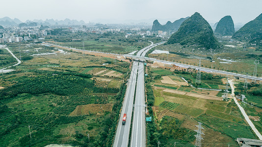 高速路口航拍高速公路山脉山桂林风光公路背景