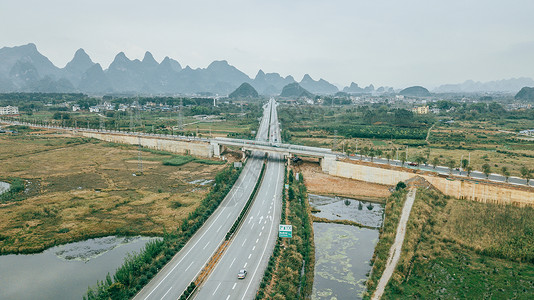 高速路口航拍高速公路山脉山桂林风光公路背景