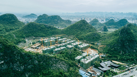 山中的楼盘航拍春耕乡间农田郊区风景田园背景