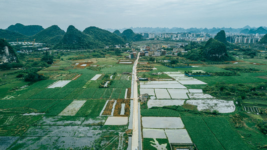 航拍春耕乡间农田郊区风景背景图片