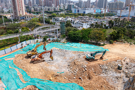 重型建筑工地上的挖掘机背景