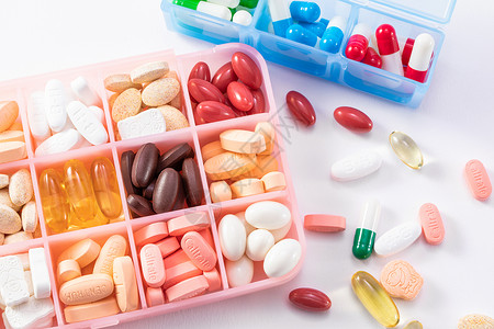 药丸组成的十字药丸和药盒背景