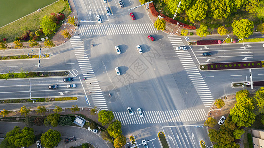 马路红绿灯背景十字路口的车流背景