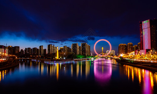 天津三岔口摩天轮夜景图片素材