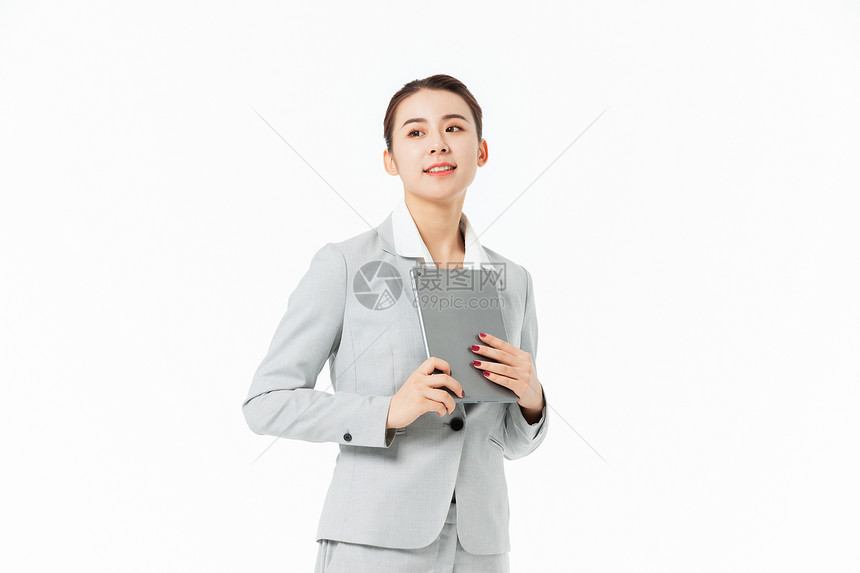 青年商务女性拿着平板电脑图片