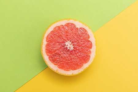 创意水果西柚切片背景图片