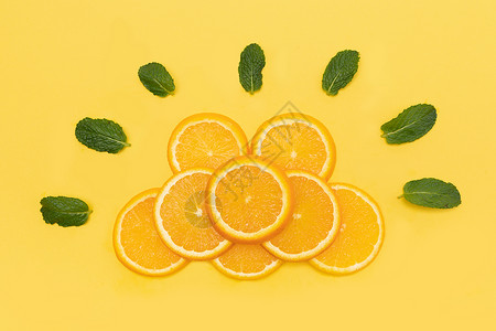 创意橙子水果切片组合背景图片