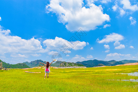 曲靖沾益海峰湿地风光女孩背影背景