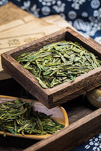 茶叶摄影泡茶毛尖茶和扁茶传统工艺背景图片