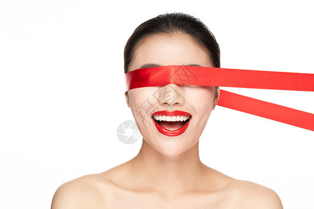 红丝带遮住眼睛女性惊喜背景
